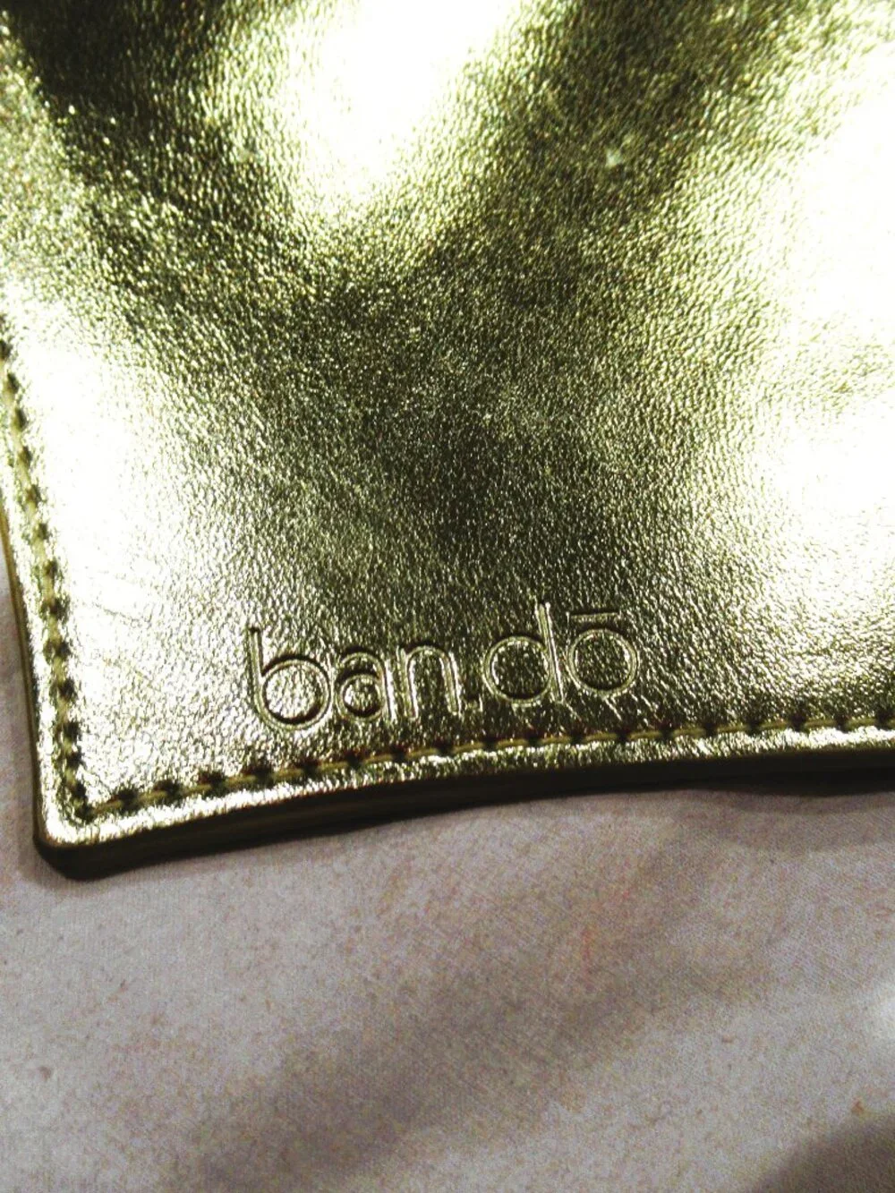 Ban.Do gold heart-shaped wristlet, pink interior